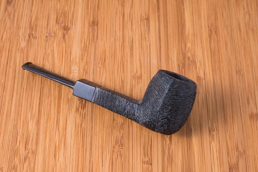 A black pipe handcrafted