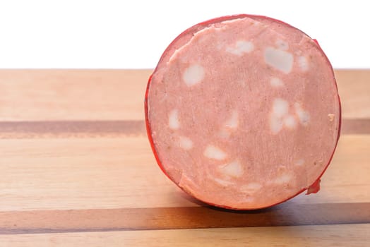 Mortadella Bologna on a wood table