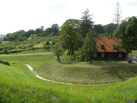 A nice cottage on a green hill