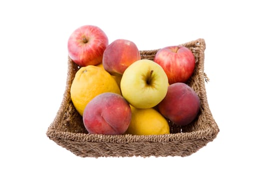 basket of fruits isolated on white