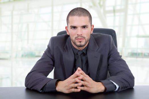 young business man on a desk, at the office
