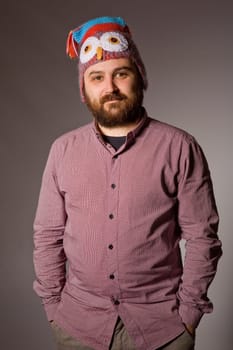 young casual man portrait in a dark background