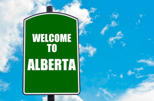 Green road sign with greeting message WELCOME TO ORLANDO isolated over clear blue sky background with available copy space. Travel destination concept  image