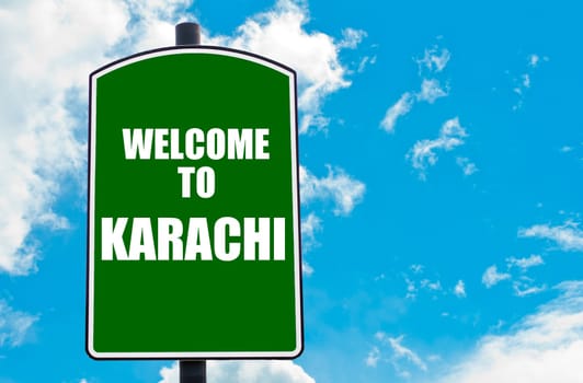 Green road sign with greeting message WELCOME TO ORLANDO isolated over clear blue sky background with available copy space. Travel destination concept  image