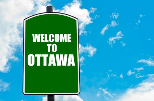 Green road sign with greeting message WELCOME TO ORLANDO isolated over clear blue sky background with available copy space. Travel destination concept  image