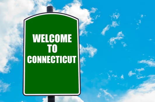 Green road sign with greeting message WELCOME TO ORLANDO isolated over clear blue sky background with available copy space. Travel destination concept  image