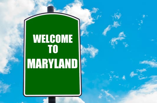 Green road sign with greeting message WELCOME TO ORLANDO isolated over clear blue sky background with available copy space. Travel destination concept  image