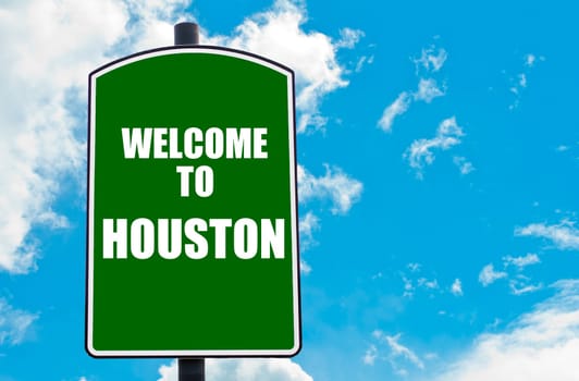 Green road sign with greeting message WELCOME TO ORLANDO isolated over clear blue sky background with available copy space. Travel destination concept  image