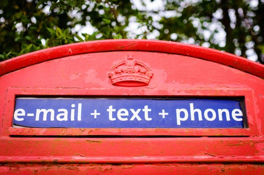 Iconic British red telephone box with filter effect applied