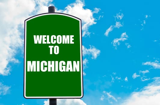 Green road sign with greeting message WELCOME TO ORLANDO isolated over clear blue sky background with available copy space. Travel destination concept  image
