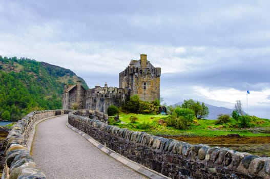 Famous Eilean Donan Castle in Scotland, UK. Situated on a small isle at the meeting point of three sea lochs - Loch Long, Loch Duich and Loch Alsh, is one of the most iconic images of Scotland.