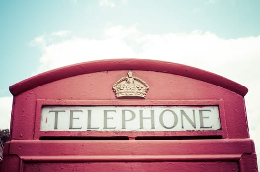 Iconic British red telephone box with filter effect applied