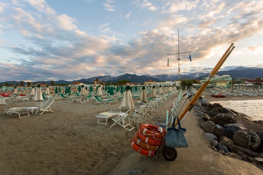 Close-up of rescue equipment with bathhouse in the background