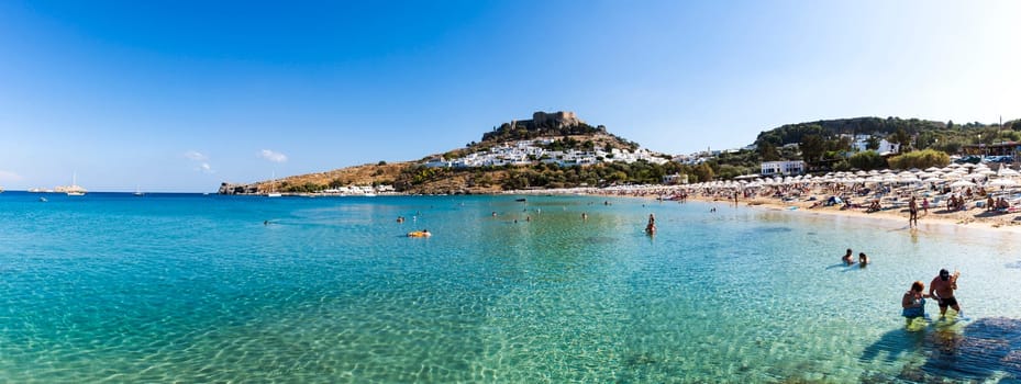 Panoramic view of Lindos bay in a sunny day