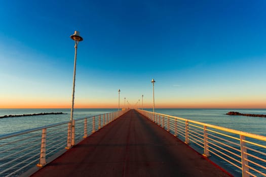 Special vision from the jetty of Marina di Massa to dawn of the new year