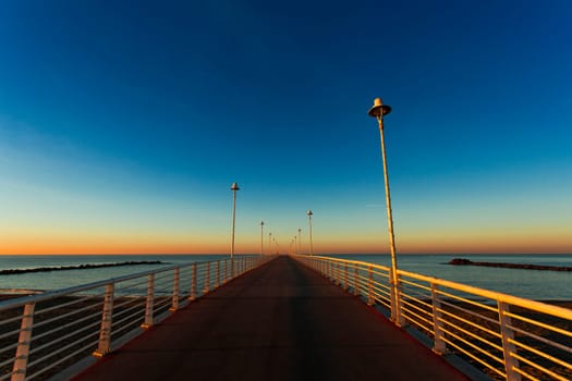 Special vision from the jetty of Marina di Massa to dawn of the new year