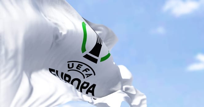 Prague, Czech Rep, July 2022: Close-up view of the UEFA Europa Conference League flag waving. Europa Conference League is an annual football club competition for european clubs