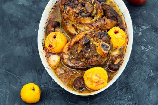 Roasted knuckle of pork with cabbage and beer. Traditional German recipe.