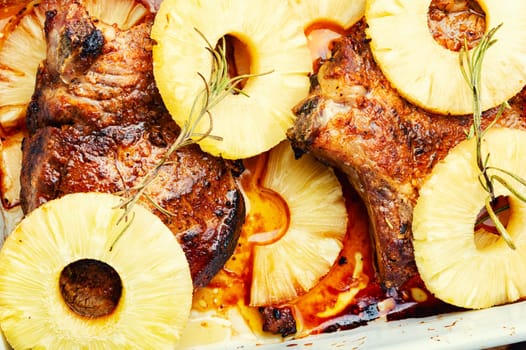 Delicious meat food ,pineapple grilled pork chop on the plate