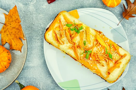 Baked casserole with pumpkin and cottage cheese. Autumn baking with pumpkin.