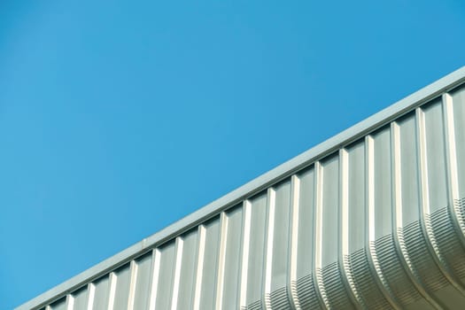Building of wall on blue sky background