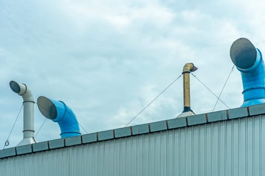 Several ventilation vents are located next to the building.