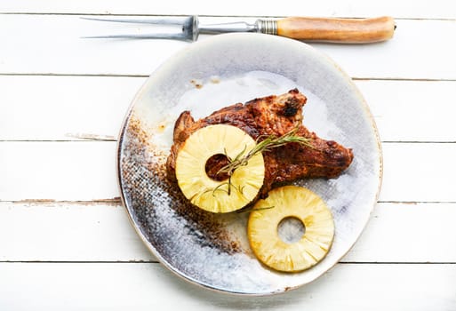 Delicious meat chop fried with pineapple rings