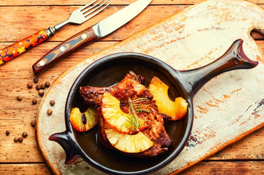 Delicious meat chop fried with pineapple rings