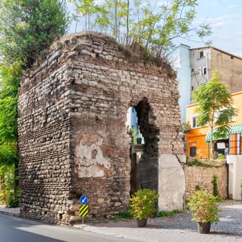 Old stone bricks wall ruins at Balat district, in a sunny summer day, Istanbul, Turkey
