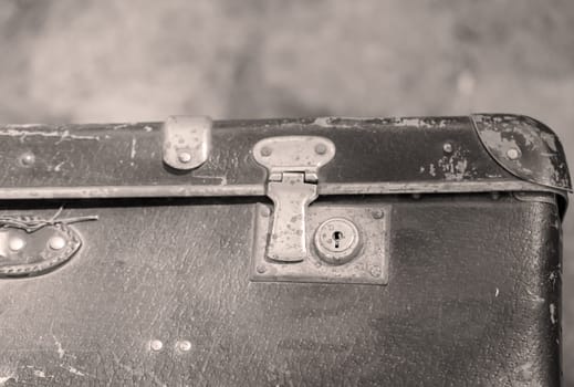 Details of an old suitcase as it was used 50 years ago.