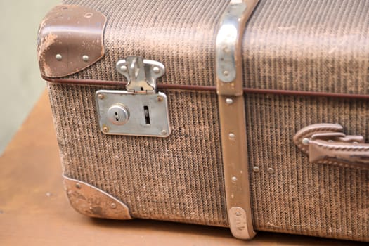 Details of an old suitcase as it was used 50 years ago.