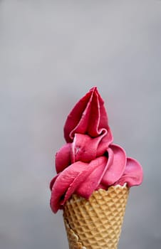 Close up of an ice cream cone, a waffle ice cream cone.