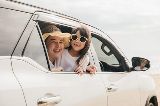 Happy family day. Asian mother father and children smiling sitting in compact white car looking out windows, Summer at the beach, Car insurance, Family holiday vacation travel, road trip concept