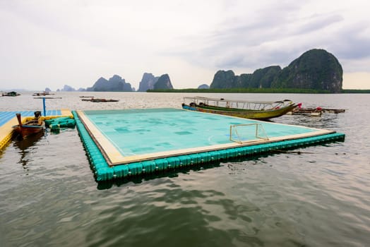 Football field floating on the sea of village at Koh Panyi or Koh Panyee island in Ao Phang Nga Bay National Park, Thailand