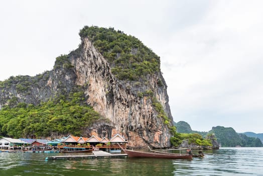 Landscape Koh Panyee or Punyi island home is floating over the sea during a boat tour at the Ao Phang Nga Bay National Park, Thailand
