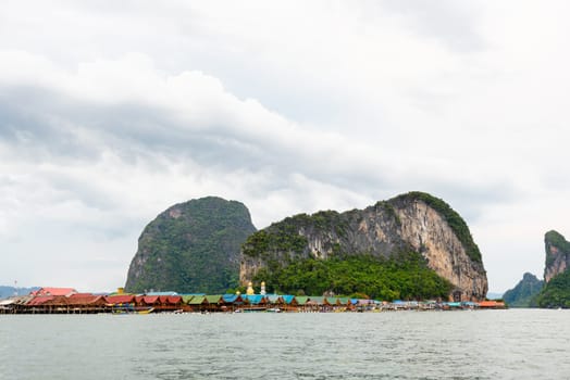 Beautiful landscape sea at Punyi Island or Koh Panyee is fisherman village cultural attractions in during a boat tour at the Ao Phang Nga Bay National Park, Thailand