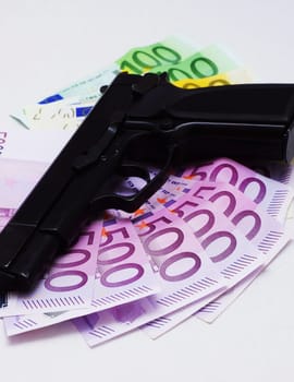 Pistol and money