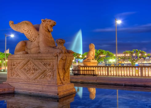 Lion statue near Brunswick monument by night in Geneva, Switzerland, HDR