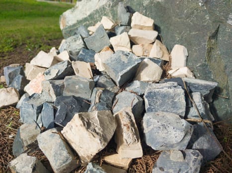 Traditional portuguese pavement. Pile of cobblestones