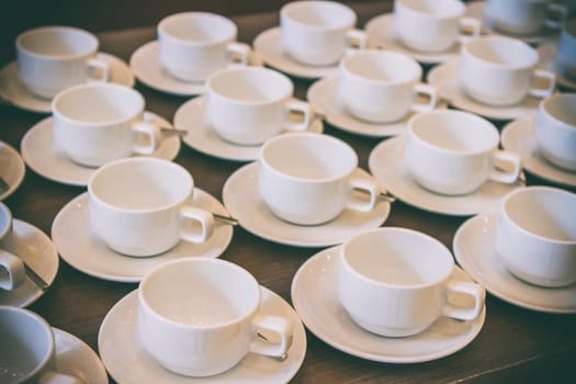 Many white coffee cups or tea of empty