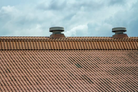 Ventilation on the old orange roof background