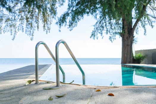 Pool with sea under the trees relax