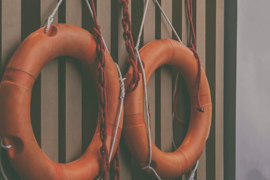 Safety Torus orange on wall wood texture