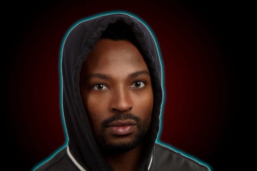 man wearing hoody on red black background and neon contour rapper trendy sport gym dancer