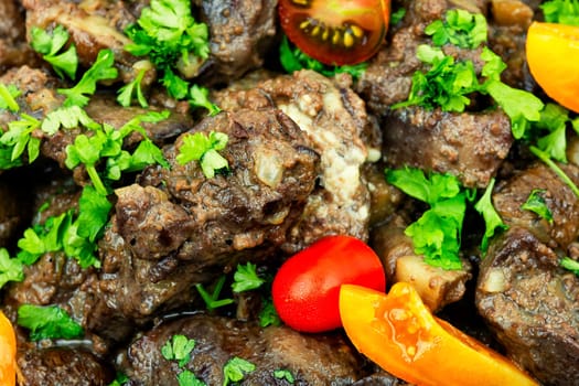 Chicken liver prepared with mushrooms and tomatoes. Liver in Georgian
