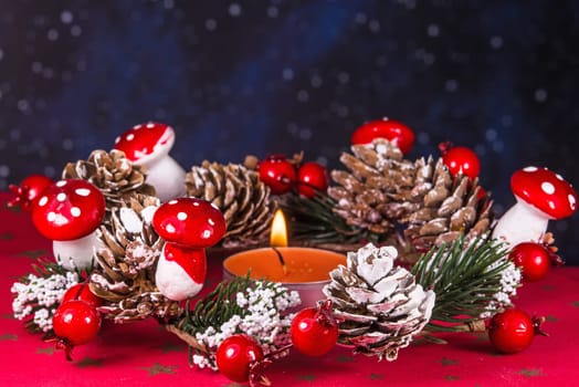 advent wreath with burning candle
