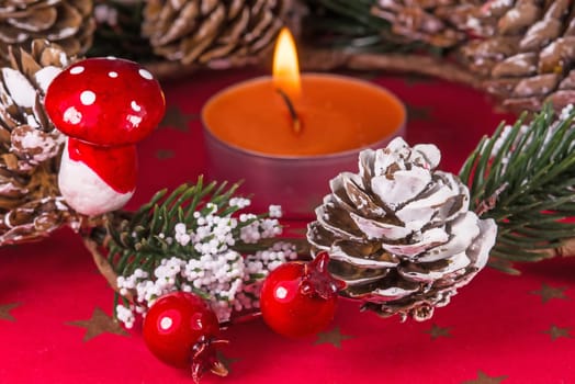 advent wreath with burning candle