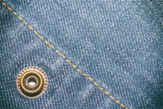 Blue jeans texture background and button and seam