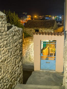 Empty alley in old town Sibenik at night