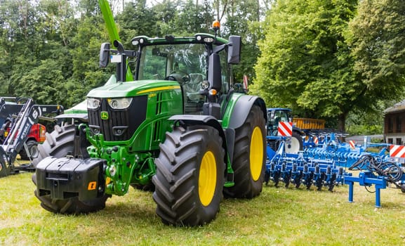 GERMANY - WETZLAR JULY 08: JOHN DEERE Tractor. John Deere is an American manufacturer of agricultural, forestry and construction machinery.